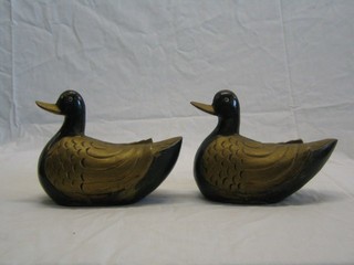 2 modern Eastern carved wooden figures of ducks