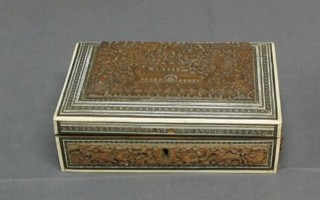 A Burmese carved trinket box with ivory banding 8"