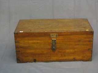A 19th Century camphor wood trunk with brass banding and hinged lid, with brass drop handles to the sides, 33"