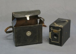 An Ensign box camera in leather case