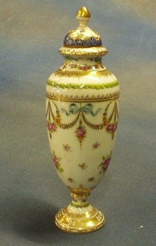 A late Dresden porcelain urn with floral decoration, the base marked Dresden 7046/1 with non matching lid 8"