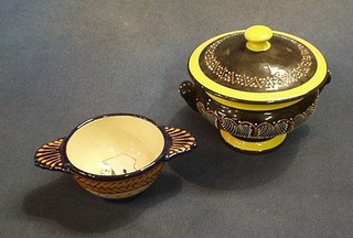 A Quimper Broderie twin handled quaiche, the base marked HB Quimper 84 and a circular lidded jar and cover 5", the base marked Quimper PF 487 D306