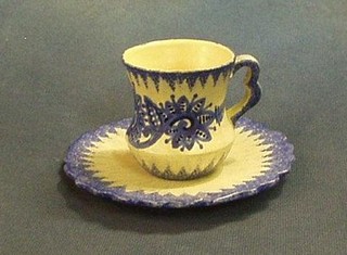 A Quimper coffee can and saucer, the base marked P Fouillen Quimper G