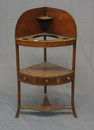 A Georgian mahogany corner wash stand with three bowl receptical and undertier fitted 2 drawers, 20"