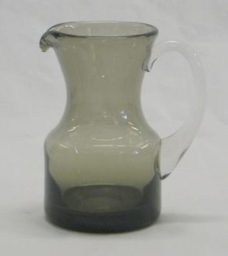 A Whitefriars small pewter effect Cream jug  with clear glass handle 4"
