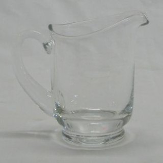 A Whitefriars small clear glass jug with clear glass handle 3 1/2"