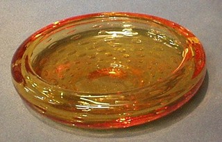 A Whitefriars large circular Amber Bubble glass ashtray 8"