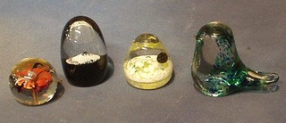 An Isles of Scilly paperweight,  a Chinese paperweight, a paperweight in the form of a seated bird and 1 other (4)