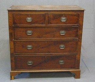 A 19th Century mahogany chest of 2 short and 3 long drawers with ebonised stringing, raised on bracket feet 40"