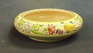 A 1960's circular Poole Pottery dish with rubber stamp mark to the base 6"