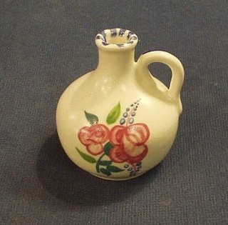 A circular Poole Pottery ewer, the base marked Poole England 387 3"