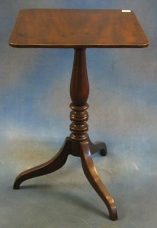 A 19th Century snap top wine table raised on turned column and tripod supports 18"