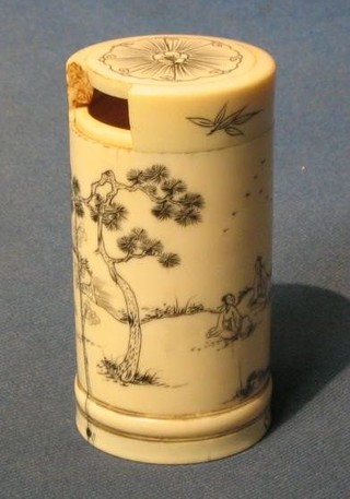 A cylindrical Oriental carved ivory trinket box decorated figures and deer, 4" (af)