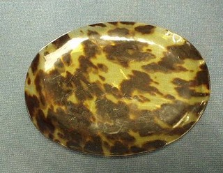 An oval tortoiseshell dish 5 1/2"