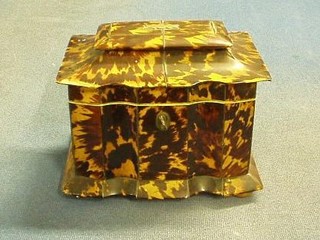 A handsome Regency ivory and tortoiseshell twin compartment tea caddy of sarcophagus form, with hinged lid, raised on 4 bun feet (1 missing) 6" (some damage)