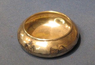 A circular Eastern silver ashtray with Niello decoration 3"
