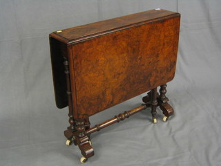 A Victorian figured walnutwood Sutherland table, raised on turned supports 31"
