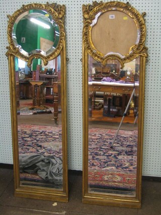 A pair of French 19th Century rectangular bevelled plate mirrors contained in a decorative gilt frames, 55" (1 f)