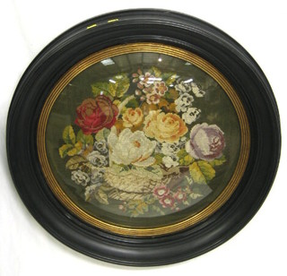 A circular Victorian Berlin panel depicting still life of flowers 21" contained in a circular oval frame