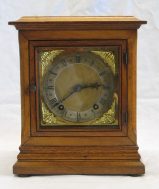 A  19th Century 8 day striking bracket clock with brass dial, silvered chapter ring, gilt metal spandrels contained in a walnutwood case