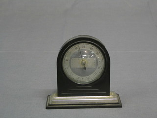 An Art Deco thermometer "Thermodial" contained in a black arched case