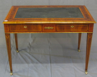 A fine quality 19th Century French figured walnutwood bureau plat inlaid tulip wood and satinwood crossbanding, with inset tooled green leather writing surface, fitted 2 drawers with gilt metal mounts, raised on square tapering supports ending in brass caps and castors, 42"