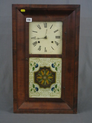 An American striking wall clock by the Newhaven Clock Co. contained in a walnutwood case
