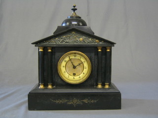 A Victorian French 8 day  mantel clock contained in a black marble architectural case