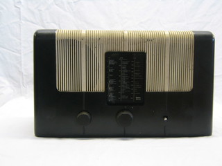 A Murphy radio in black and white Bakelite case (1 knob missing)