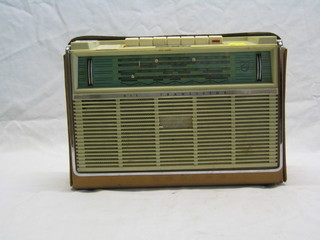A Phillips transistor portable radio (some damage to case) 