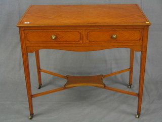 An Edwardian satinwood side table with line inlay, fitted 2 frieze drawers, raised on square tapering supports with X framed stretcher and undertier 36"