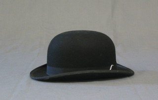 A gentleman's bowler hat by Dunn & Co 7 1/4