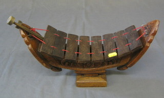An Eastern wooden xylophone and a bridge of hardwood elephants