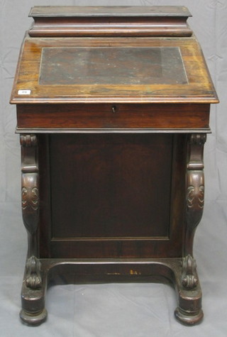 A Victorian rosewood Davenport desk with hinged stationery box, the pedestal fitted 4 drawers and raised on cabriole supports 23"
