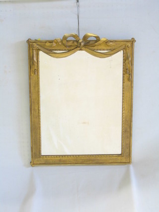 A 19th/20th Century rectangular plate mirror contained in a gilt painted frame with swag decoration 22"