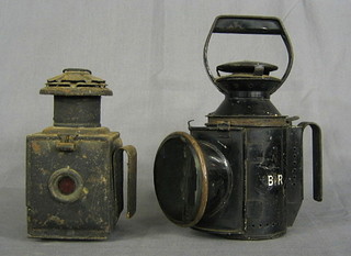 A British Railways hand lantern (lens f) and a coaching lantern (f)