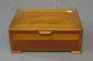 A wooden sewing box with contents 12"