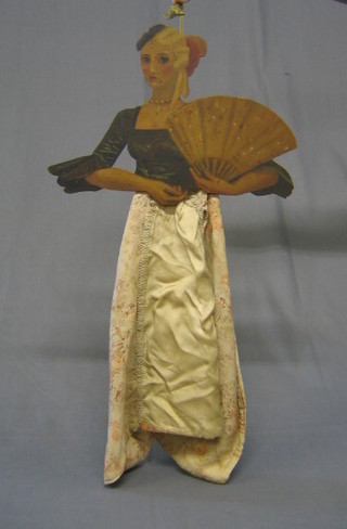 A hanging torso figure of a lady with fan 13"