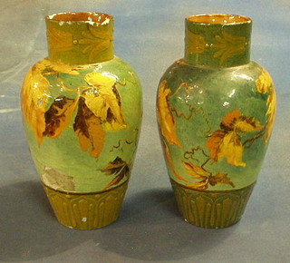 A pair of Doulton vases, the bases incised FR, 11" (some chips to rim)