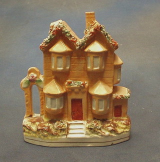 A 19th Century flat back Staffordshire ornament in the form of a house 8" (1 chimney f)