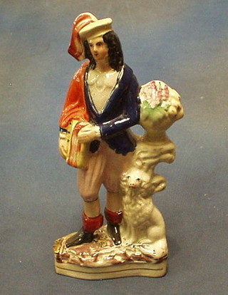 A 19th Century Staffordshire figure with accordion and dog 10"