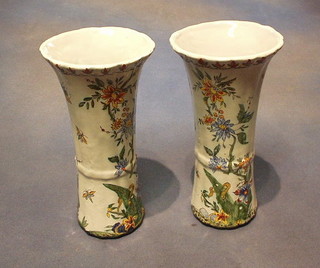 A pair of Desvres 19th Century vases of flared design with floral decoration