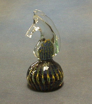 A glass paperweight in the form of a sea horse 5"