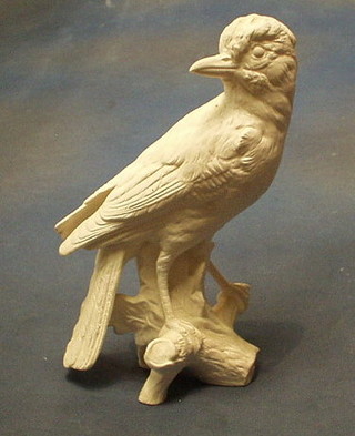 A Hummel biscuit porcelain figure of a seated bird, the base marked CV 94 1938 10"