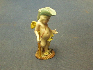 A 19th Century miniature porcelain figure of a boy with stick (f and r)