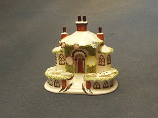 A reproduction Coalport Staffordshire pastel burner "Keepers Cottage" 