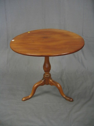 A 19th  Century fruitwood circular snap top tea table, raised on bulbous turned and tripod supports, (R), 30"