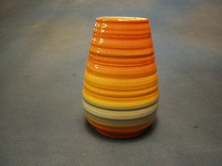 A Shelley circular orange glazed vase with line decoration, the base marked 973, 6"