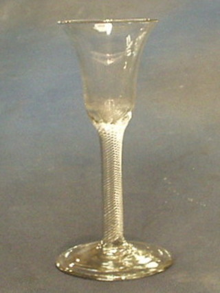 An 18th Century bell shaped ale glass with air twist stem