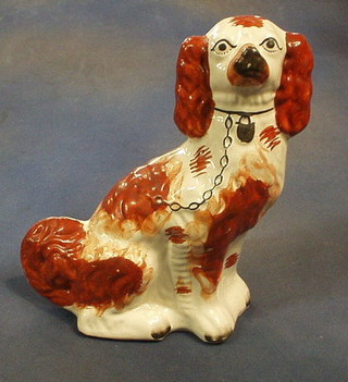 A Staffordshire figure of a seated Spaniel 9"